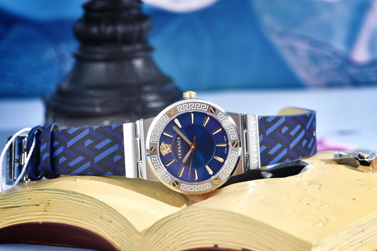 Greca Logo - L&M Luxury Timepieces