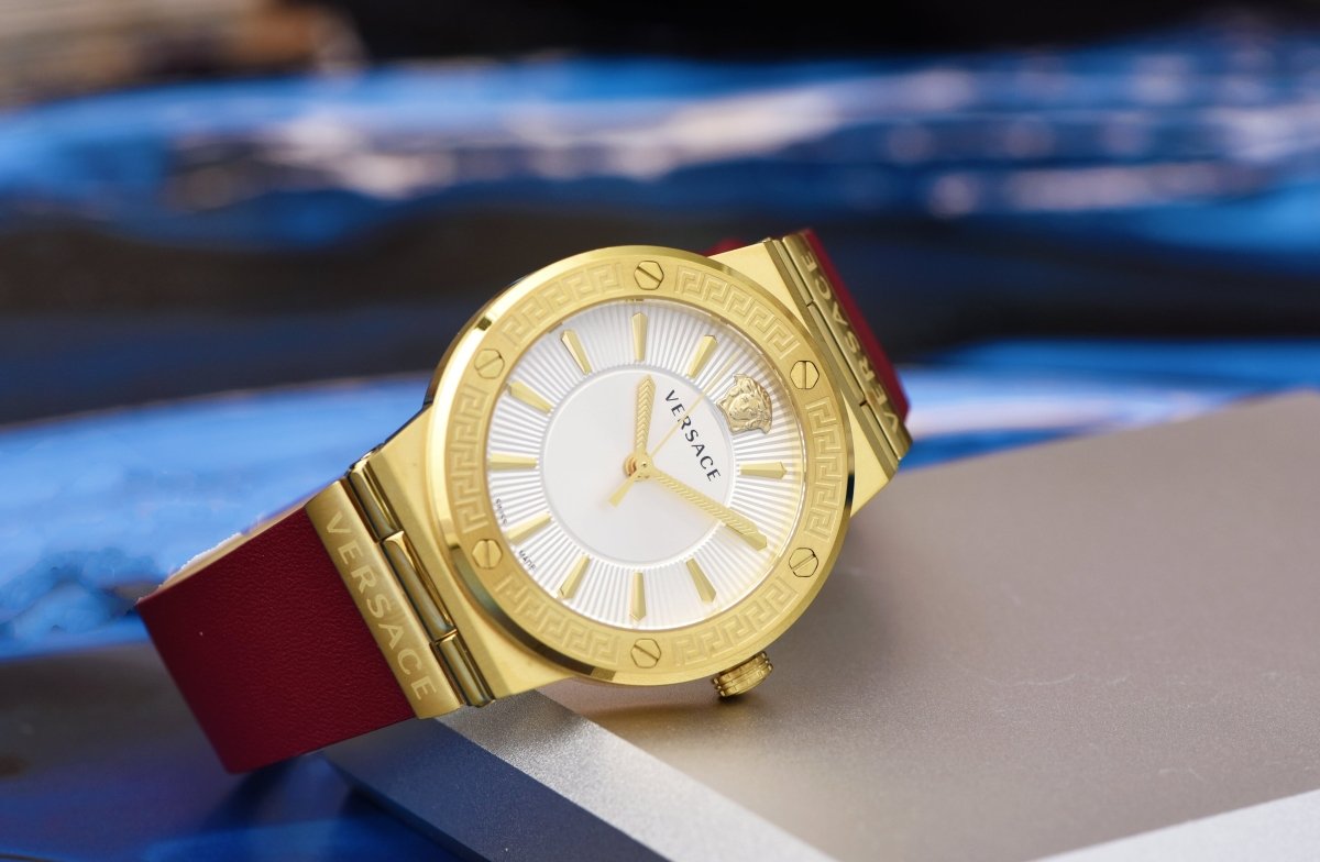 Greca Logo - L&M Luxury Timepieces