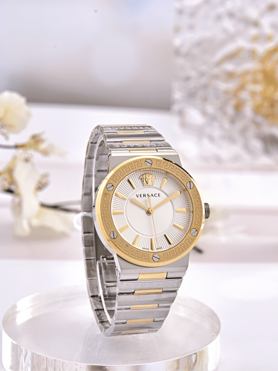 Greca Logo - L&M Luxury Timepieces