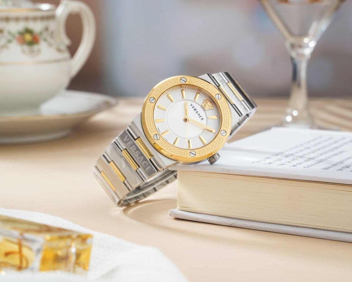 Greca Logo - L&M Luxury Timepieces