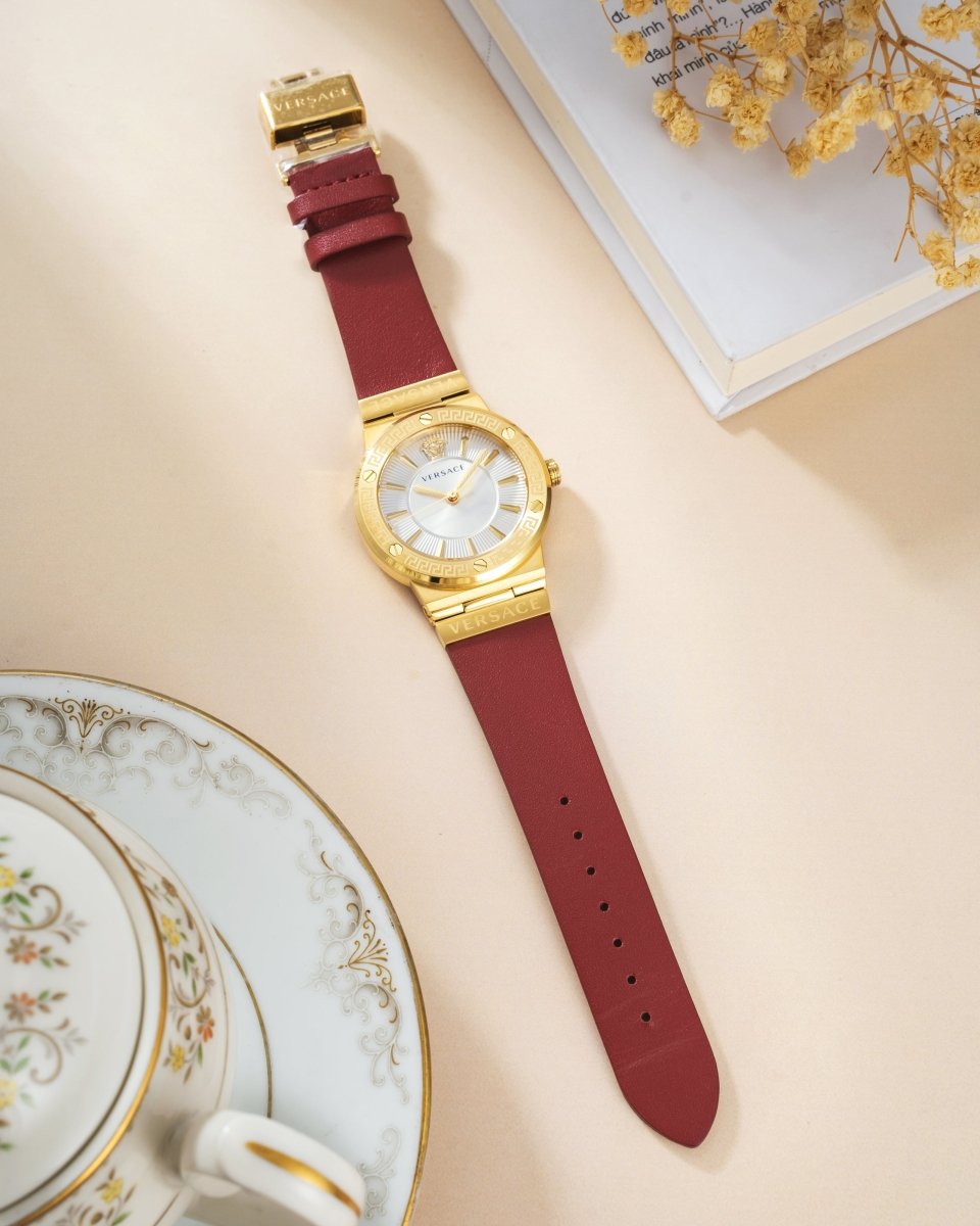 Greca Logo - L&M Luxury Timepieces