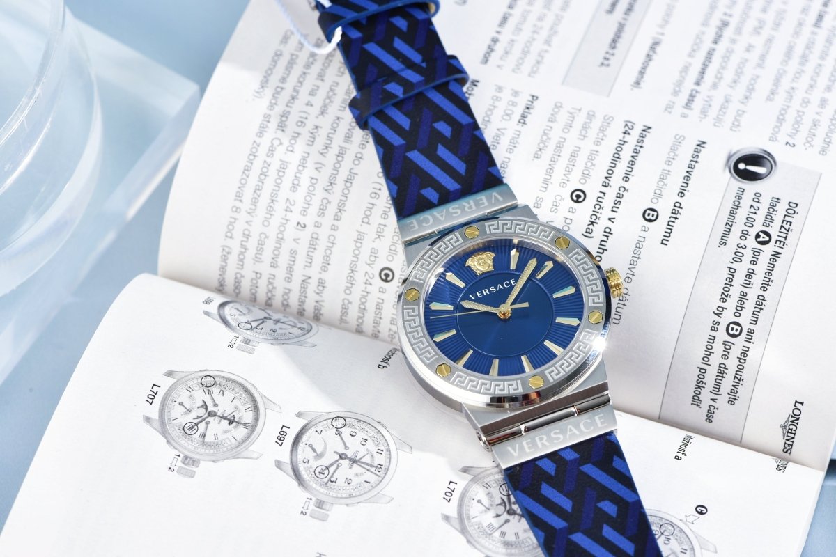 Greca Logo - L&M Luxury Timepieces