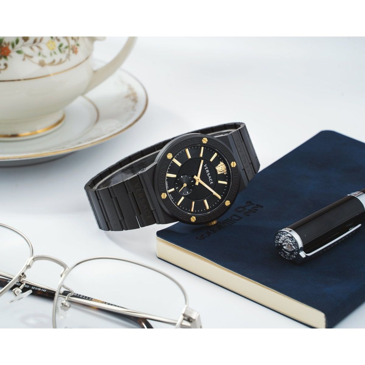 Greca Logo - L&M Luxury Timepieces