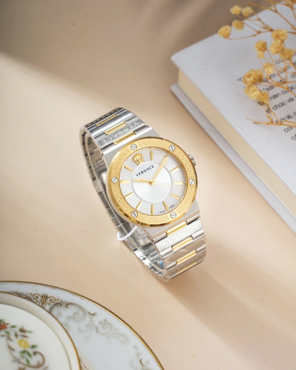 Greca Logo - L&M Luxury Timepieces