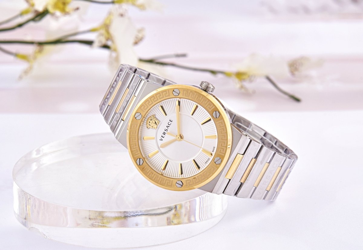 Greca Logo - L&M Luxury Timepieces