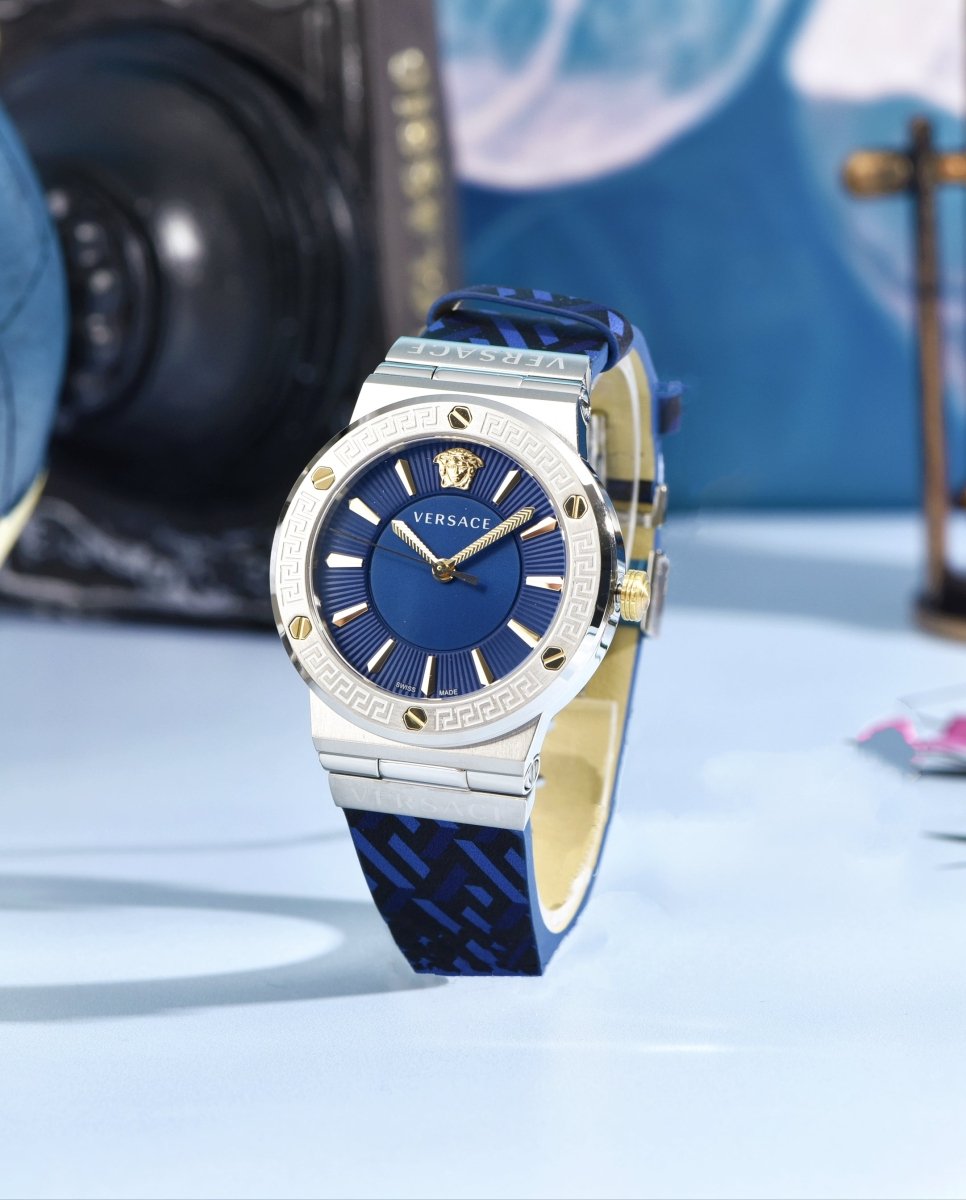Greca Logo - L&M Luxury Timepieces