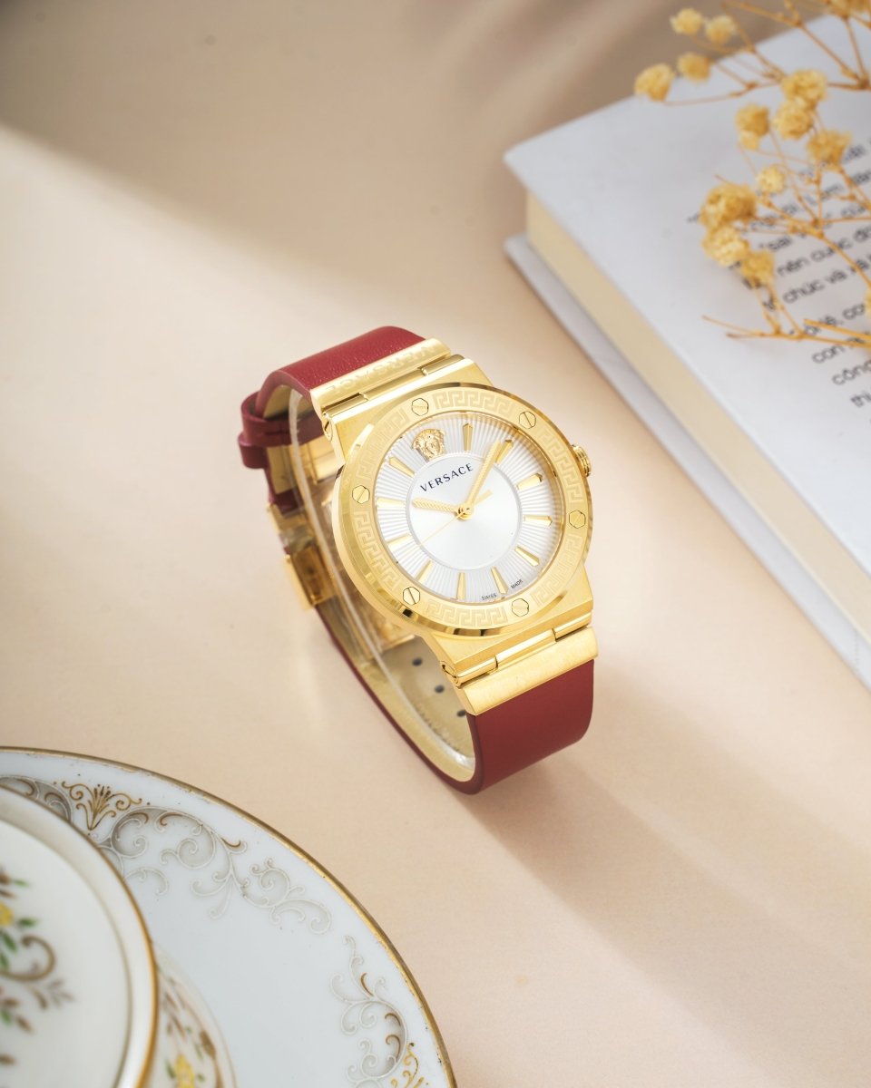 Greca Logo - L&M Luxury Timepieces