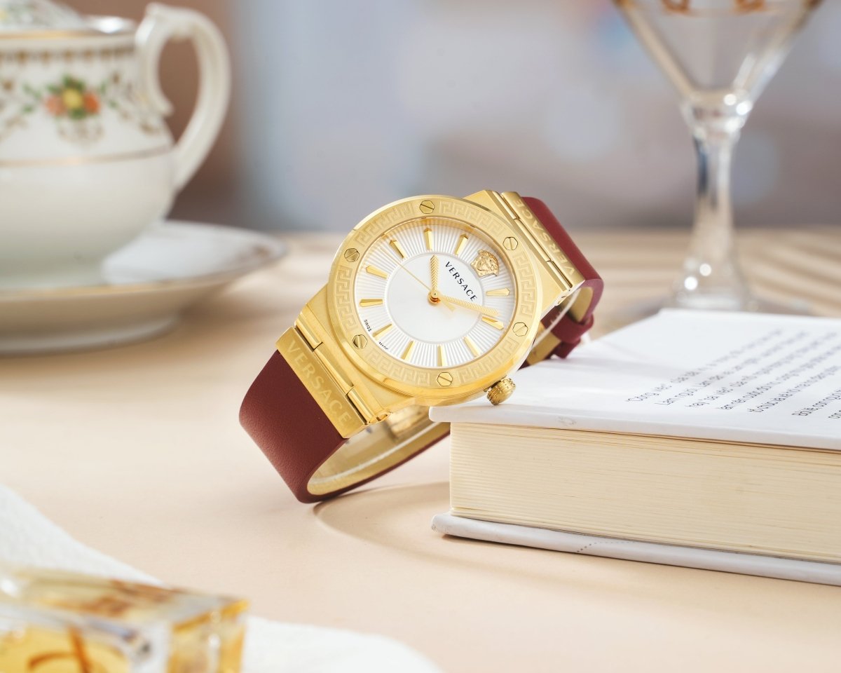 Greca Logo - L&M Luxury Timepieces