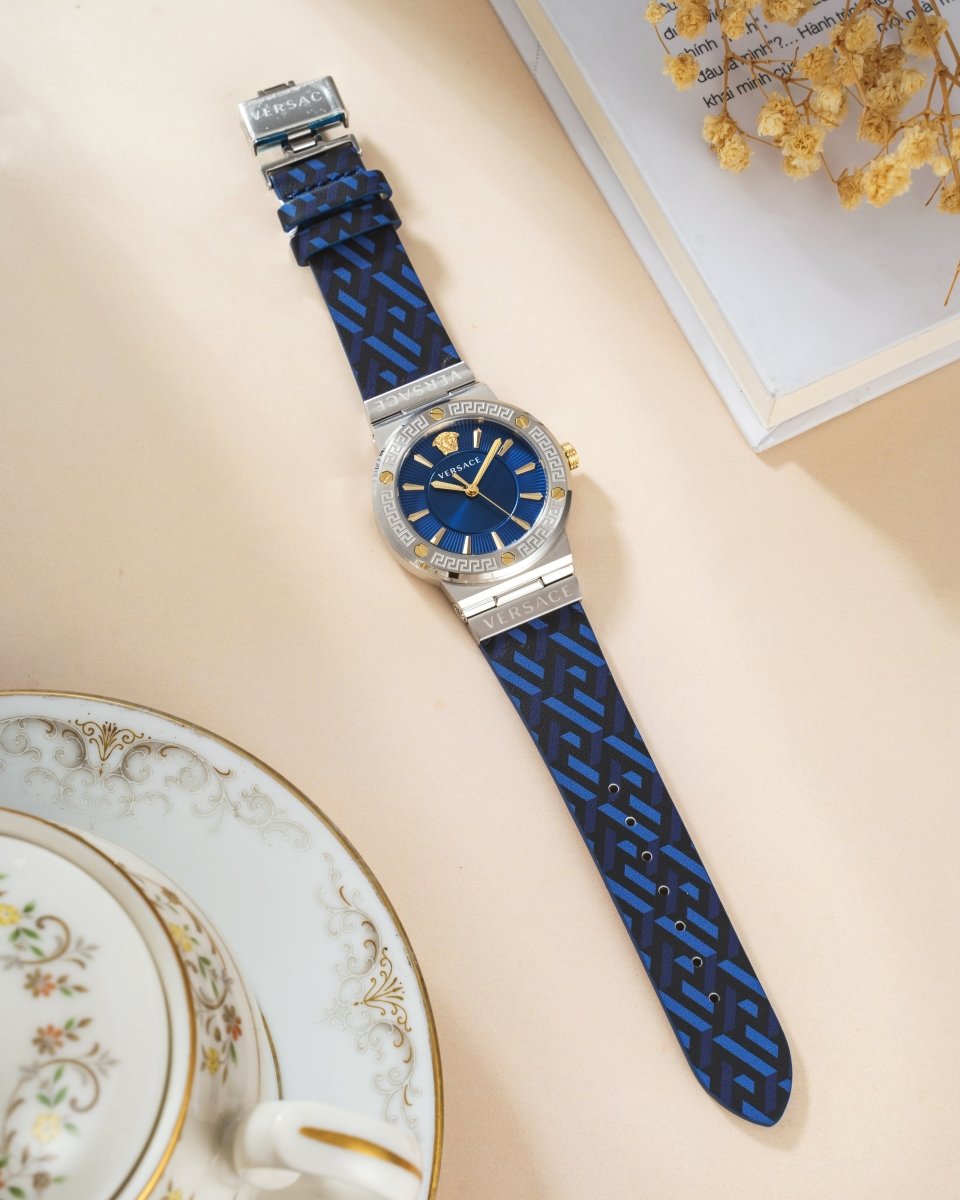 Greca Logo - L&M Luxury Timepieces