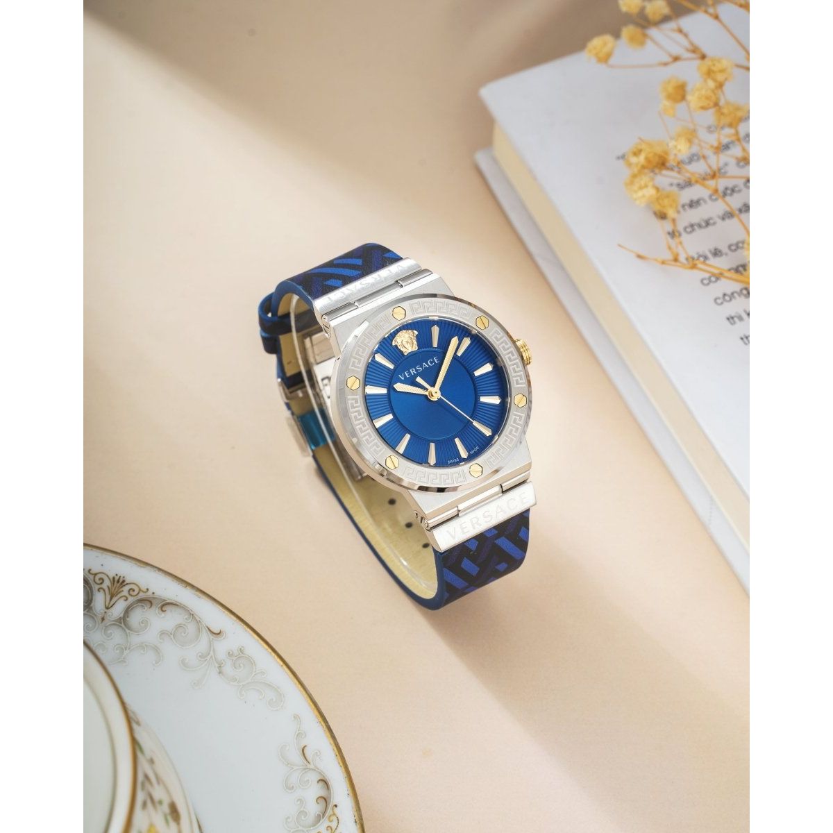 Greca Logo - L&M Luxury Timepieces